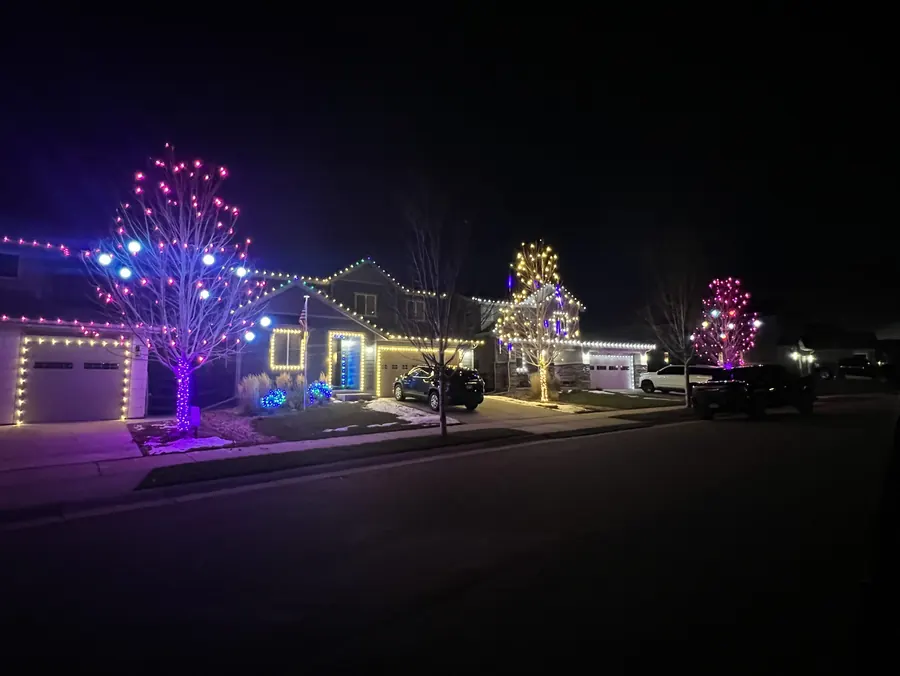 Three neighbouring homes on the same Firestone, Colorado street all lit on the same night