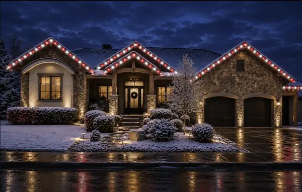 Home roofline in alternating red and warm white bulbs